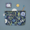 Bright and colourful bird and floral wash bag. Ideal for holidays, an excellent gift for anyone that loves birds and nature, or lives in the countryside. Navy blue with white waterproof lining. Original paintings are used to create this pattern, including Goldcrests, 17 different types of British Butterflies, Cornflowers, thistles, common mallow, cosmos and poppies.